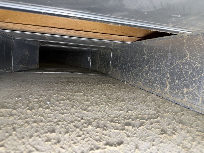 Heavy cobwebs before Super Ducts cleaning